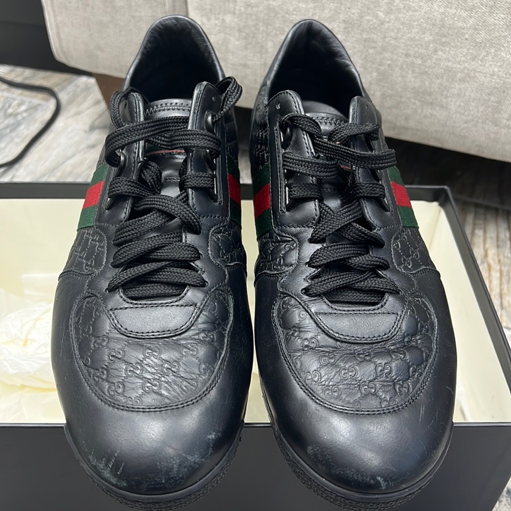 black men’s Gucci sneakers in a size 45 (us12)